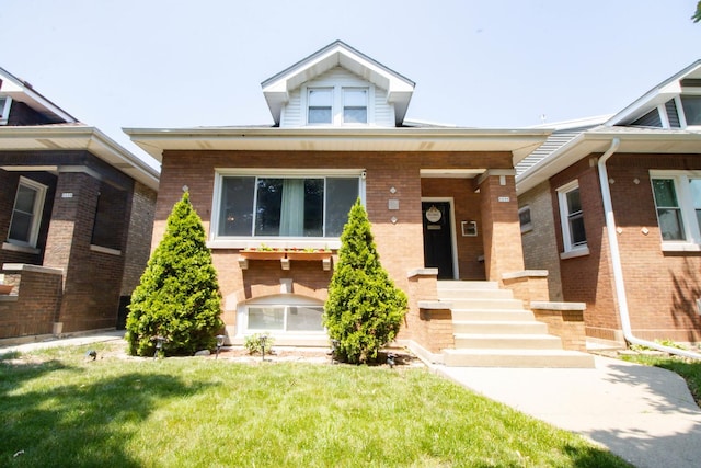 5236 W Nelson St, Chicago, IL 60641 - view of front of property with brick siding and a front lawn