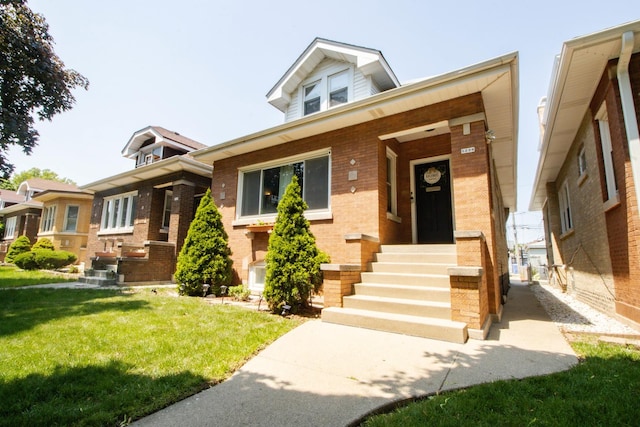 5236 W Nelson St, Chicago, IL 60641 - view of front of property with brick siding and a front lawn