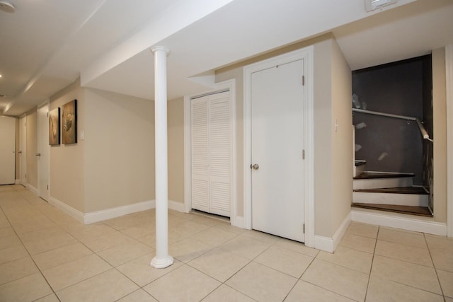 5236 W Nelson St, Chicago, IL 60641 - finished below grade area with light tile patterned flooring and stairway