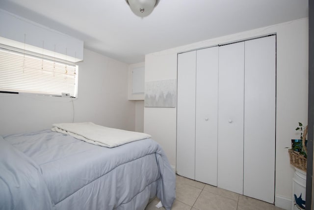5236 W Nelson St, Chicago, IL 60641 - bedroom featuring a closet and light tile patterned floors