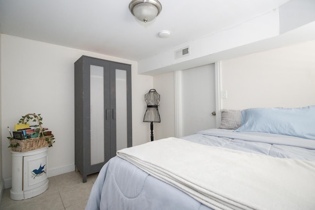 5236 W Nelson St, Chicago, IL 60641 - bedroom with light tile patterned floors and baseboards
