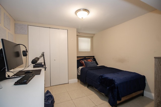 5236 W Nelson St, Chicago, IL 60641 - bedroom featuring light tile patterned flooring and a closet