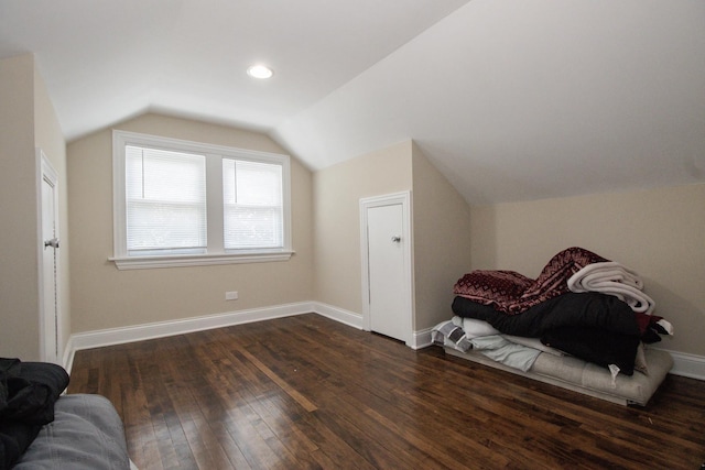 5236 W Nelson St, Chicago, IL 60641 - living area with vaulted ceiling and dark wood-type flooring