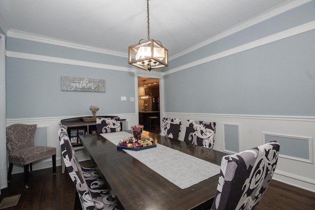 5236 W Nelson St, Chicago, IL 60641 - dining area with a chandelier, a wainscoted wall, crown molding, and wood finished floors