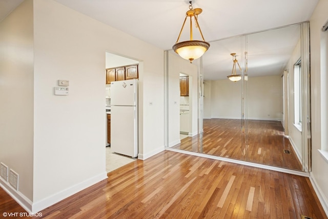 218 E Forest Knoll Dr, Palatine, IL 60074 - unfurnished room with light wood-type flooring and baseboards