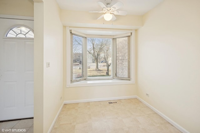 218 E Forest Knoll Dr, Palatine, IL 60074 - unfurnished dining area with a ceiling fan and baseboards