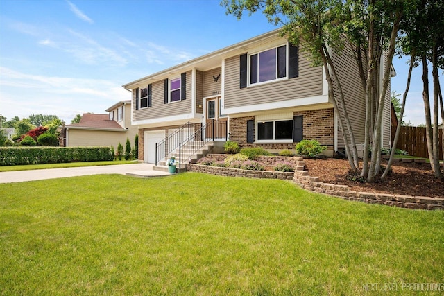 1035 Warwick Cir N, Hoffman Estates, IL 60169 - bi-level home featuring brick siding, driveway, and an attached garage