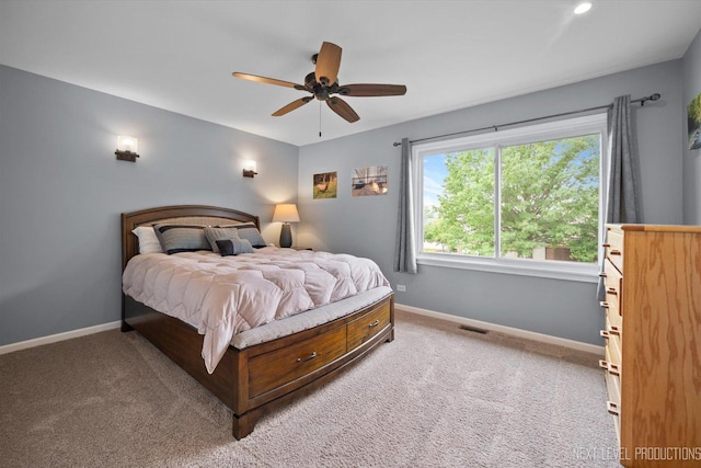 1035 Warwick Cir N, Hoffman Estates, IL 60169 - carpeted bedroom with baseboards and a ceiling fan