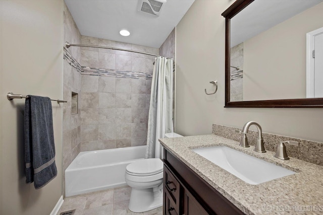 1035 Warwick Cir N, Hoffman Estates, IL 60169 - full bathroom with vanity, shower / bath combo, and tile patterned floors