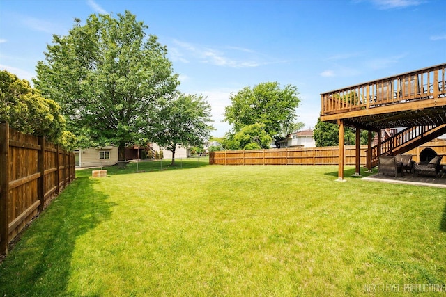 1035 Warwick Cir N, Hoffman Estates, IL 60169 - fenced backyard featuring a wooden deck and stairs