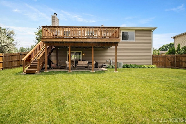 1035 Warwick Cir N, Hoffman Estates, IL 60169 - back of house with a wooden deck, a fenced backyard, outdoor lounge area, stairs, and a patio area