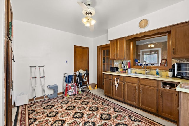 415 Fremont St, Lemont, IL 60439 - kitchen featuring a sink, light countertops, tasteful backsplash, and brown cabinets