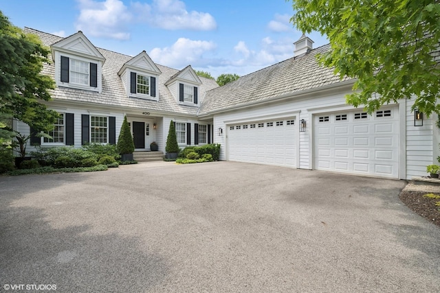400 Saint Andrews Ln, Gurnee, IL 60031 - cape cod house featuring driveway and a garage