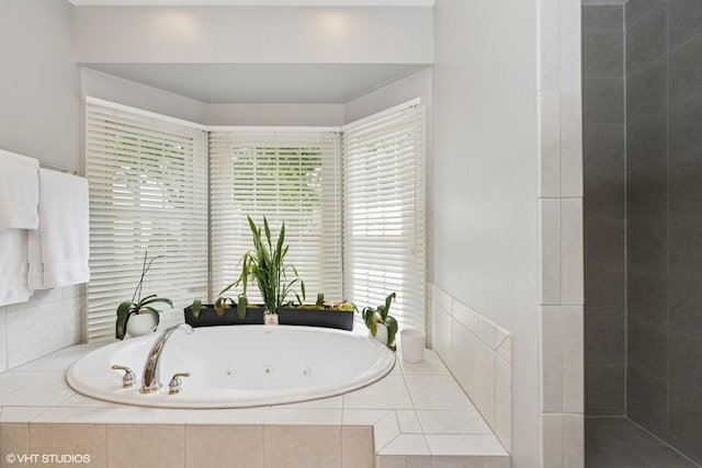 400 Saint Andrews Ln, Gurnee, IL 60031 - bathroom featuring healthy amount of natural light and a tub with jets