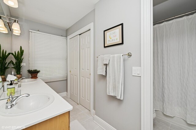 400 Saint Andrews Ln, Gurnee, IL 60031 - bathroom featuring tile patterned flooring and double vanity