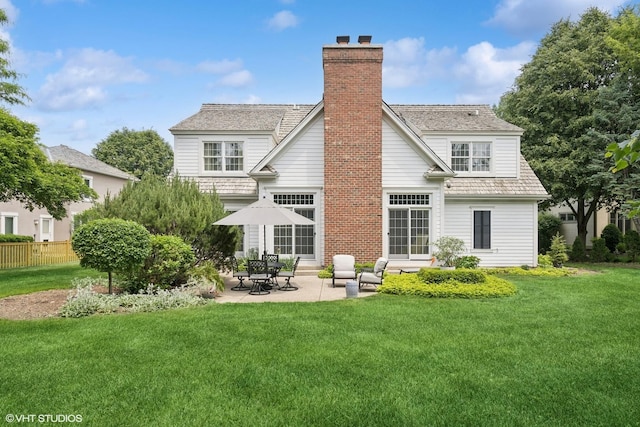 400 Saint Andrews Ln, Gurnee, IL 60031 - back of property with a chimney and a patio