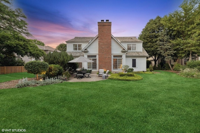 400 Saint Andrews Ln, Gurnee, IL 60031 - rear view of house with a patio area, a chimney, and roof with shingles