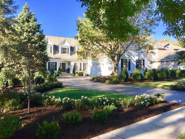 400 Saint Andrews Ln, Gurnee, IL 60031 - view of front of house featuring asphalt driveway, a garage, and a front yard