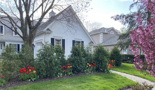 400 Saint Andrews Ln, Gurnee, IL 60031 - view of home's exterior with a lawn and an attached garage