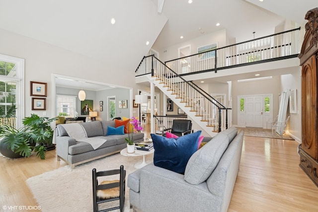 400 Saint Andrews Ln, Gurnee, IL 60031 - living room featuring stairs, high vaulted ceiling, light wood-type flooring, and recessed lighting