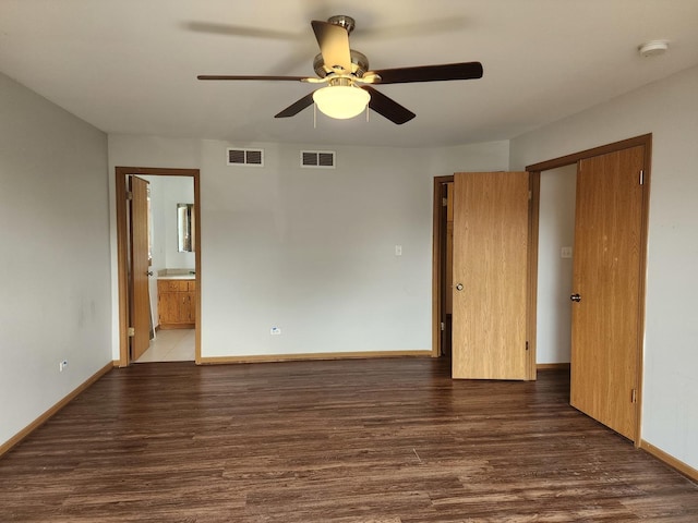 609 Flanagan Dr, Minooka, IL 60447 - unfurnished bedroom featuring wood finished floors, ensuite bath, and ceiling fan