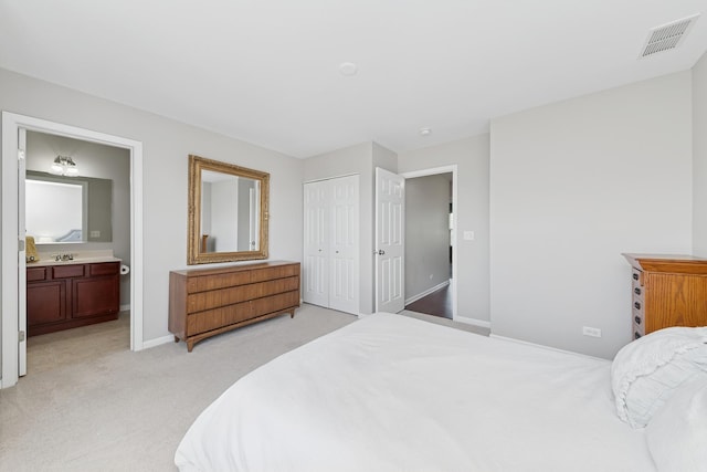 6518 Lilac Blvd, Hanover Park, IL 60133 - bedroom featuring light colored carpet, a closet, and connected bathroom