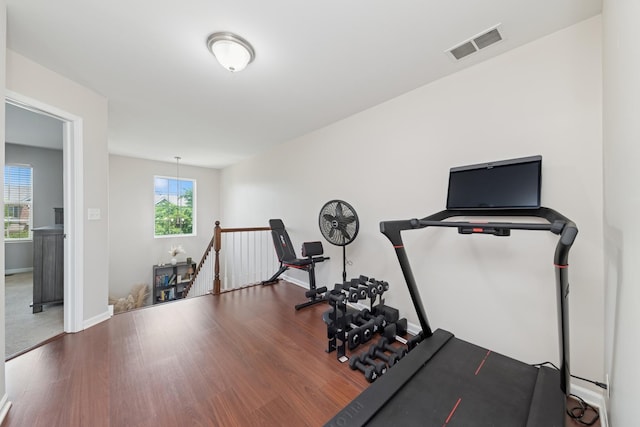 6518 Lilac Blvd, Hanover Park, IL 60133 - exercise area with wood finished floors and baseboards