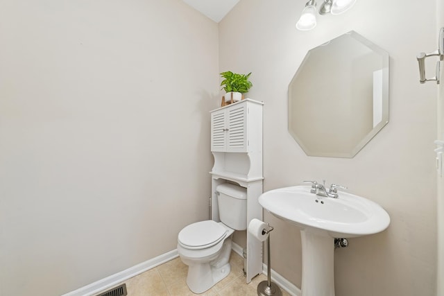 6518 Lilac Blvd, Hanover Park, IL 60133 - bathroom with toilet and tile patterned flooring