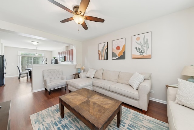 6518 Lilac Blvd, Hanover Park, IL 60133 - living area featuring a ceiling fan and dark wood finished floors