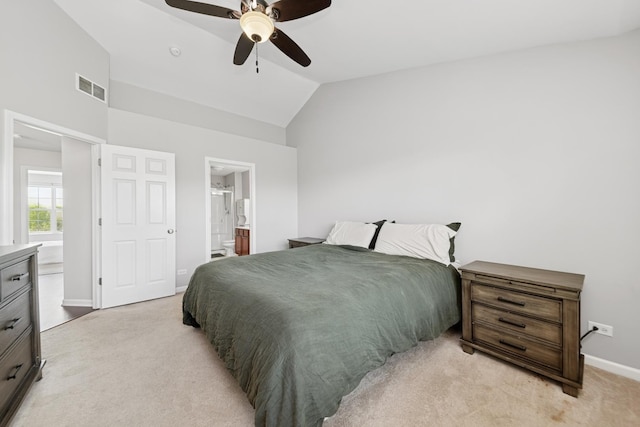 6518 Lilac Blvd, Hanover Park, IL 60133 - bedroom with light colored carpet, vaulted ceiling, ensuite bathroom, and a ceiling fan
