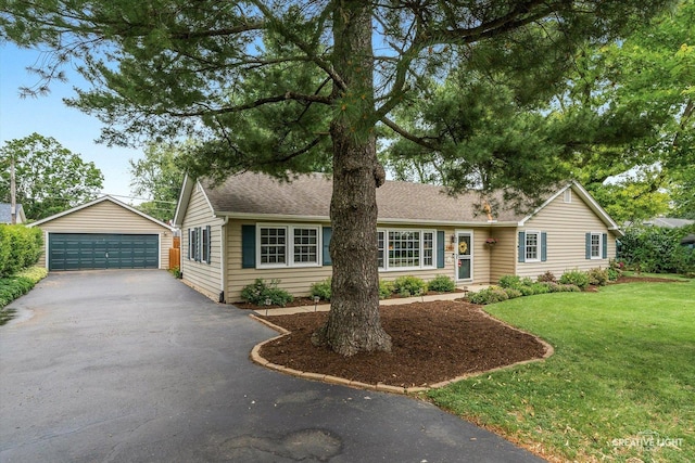 23551 W Winston Ave, Plainfield, IL 60586 - ranch-style house with a detached garage, an outdoor structure, roof with shingles, and a front lawn