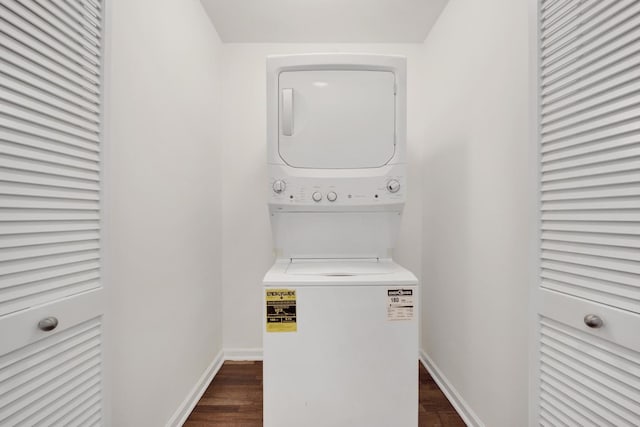 1255 S State St Unit 1704, Chicago, IL 60605 - laundry area with stacked washing machine and dryer and dark wood-style floors