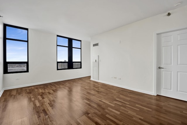 1255 S State St Unit 1704, Chicago, IL 60605 - spare room with wood finished floors and a smoke detector