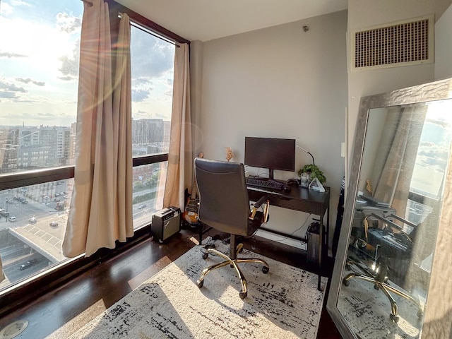 210 S Desplaines St Unit 1410, Chicago, IL 60661 - office area featuring wood finished floors and a wall of windows