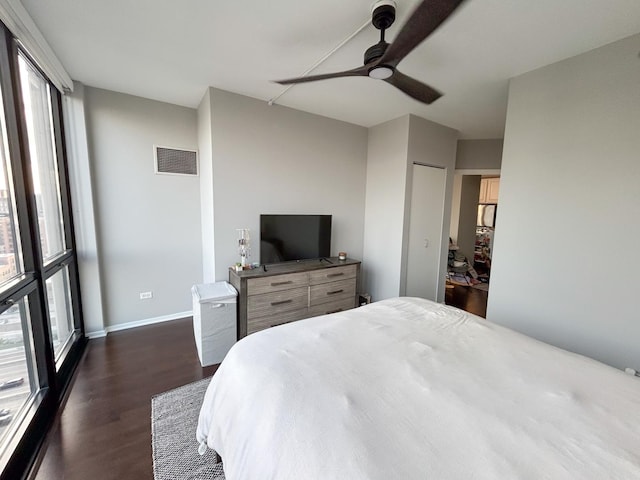 210 S Desplaines St Unit 1410, Chicago, IL 60661 - bedroom with dark wood-style flooring and ceiling fan