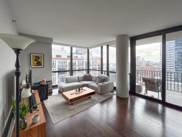 210 S Desplaines St Unit 1410, Chicago, IL 60661 - living area with a view of city, a wall of windows, wood finished floors, and healthy amount of natural light