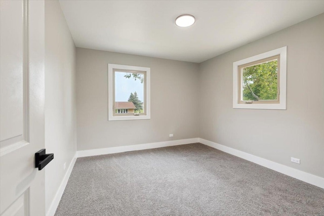 919 E Cooper Dr, Palatine, IL 60074 - carpeted spare room featuring baseboards
