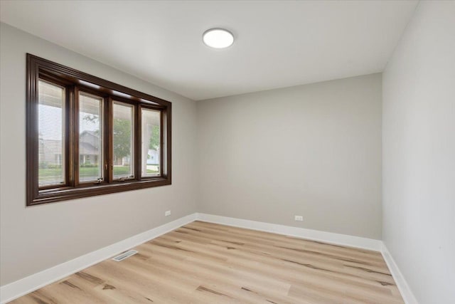 919 E Cooper Dr, Palatine, IL 60074 - empty room featuring light wood finished floors and baseboards
