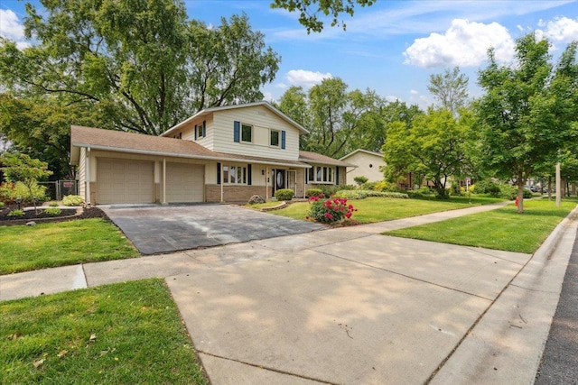919 E Cooper Dr, Palatine, IL 60074 - traditional home featuring a garage, driveway, and brick siding