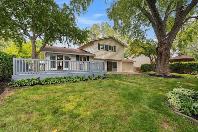 919 E Cooper Dr, Palatine, IL 60074 - rear view of property with a lawn and a deck
