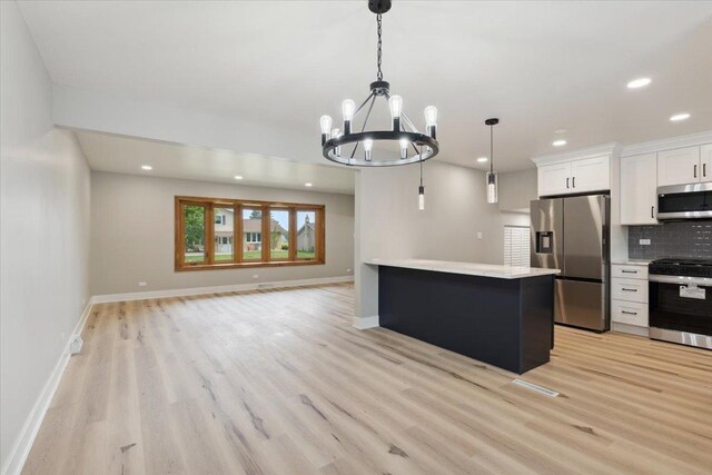 919 E Cooper Dr, Palatine, IL 60074 - kitchen featuring appliances with stainless steel finishes, light wood-type flooring, white cabinetry, recessed lighting, and light countertops