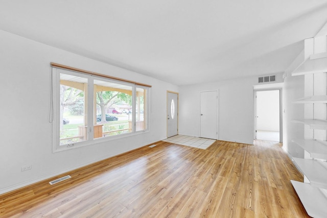 137 S Schmidt Rd, Bolingbrook, IL 60440 - unfurnished living room featuring light wood finished floors