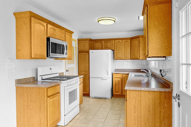 137 S Schmidt Rd, Bolingbrook, IL 60440 - kitchen featuring white appliances, a sink, decorative backsplash, and light tile patterned floors