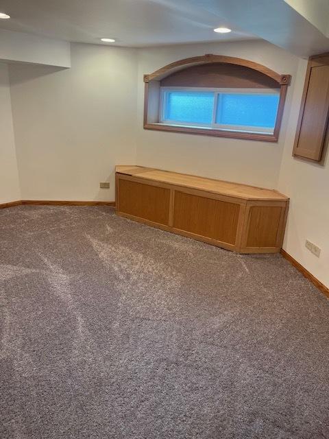 6111 S Menard Ave, Chicago, IL 60638 - carpeted empty room featuring baseboards and recessed lighting
