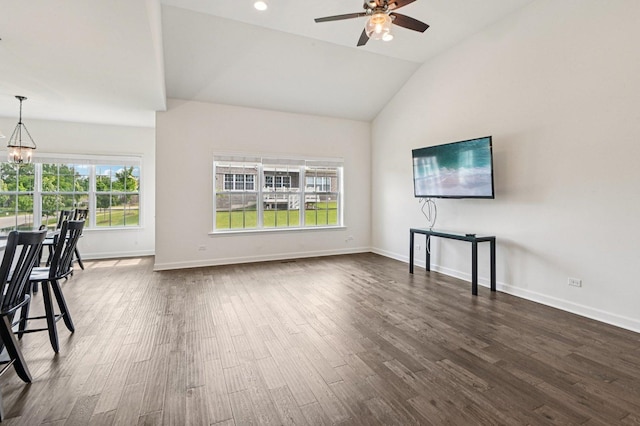 1518 128th St, Lemont, IL 60439 - living area featuring ceiling fan, dark wood-style flooring, vaulted ceiling, and a chandelier