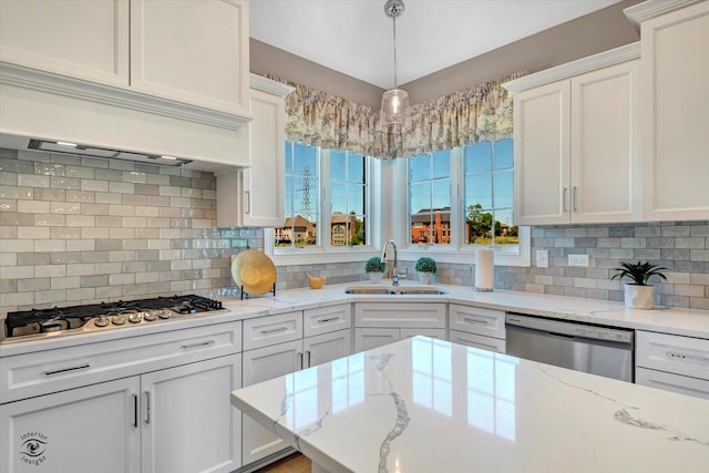 8830 Indiana Harbor Dr, Frankfort, IL 60423 - kitchen with a sink, appliances with stainless steel finishes, white cabinets, and tasteful backsplash
