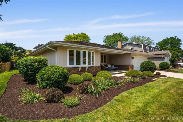 1614 Orth Dr, Wheaton, IL 60189 - view of front of home with a garage and a chimney