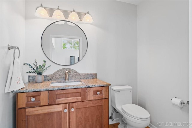 1614 Orth Dr, Wheaton, IL 60189 - half bath featuring vanity and toilet