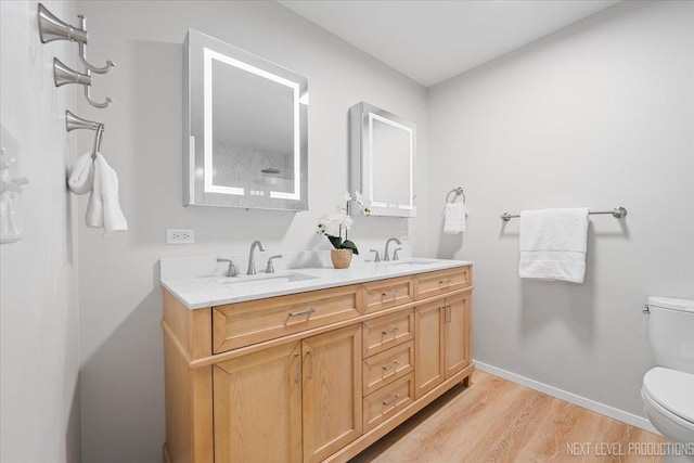 1614 Orth Dr, Wheaton, IL 60189 - bathroom featuring wood finished floors and double vanity