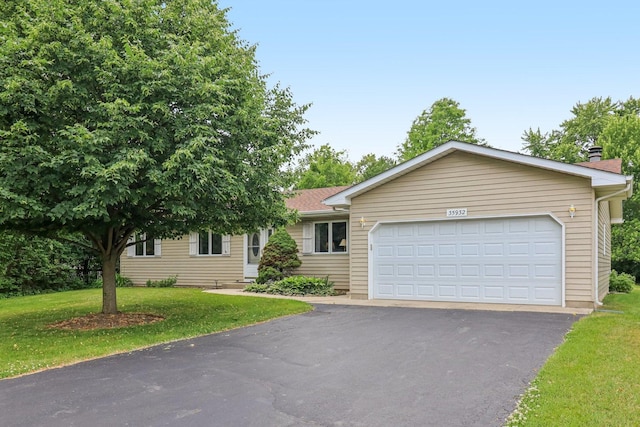 35932 N Watson Ave, Ingleside, IL 60041 - single story home featuring driveway, a front yard, and an attached garage